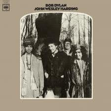 Cover of Bob Dylan's album John Wesley Harding Source: bobdylan.com Standing on either side of Body Dylan are Laxman Das Baul and Purna Das Baul, popular musicians in the Baul tradition.